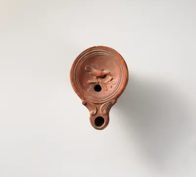 Terracotta oil lamp