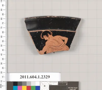 Terracotta rim fragment of a kylix (drinking cup)
