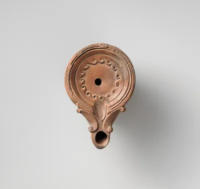Terracotta oil lamp