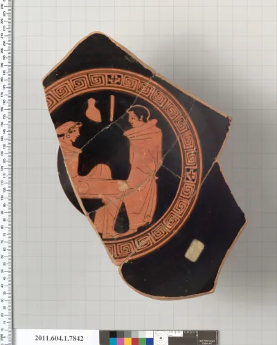 Terracotta fragment of a kylix (drinking cup)