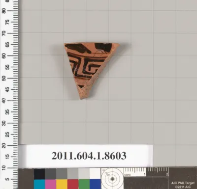 Terracotta fragment of a stemless kylix (drinking cup)