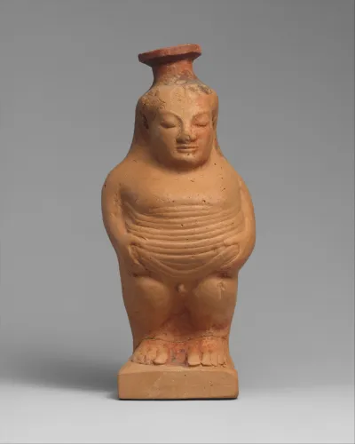 Terracotta aryballos (perfume vase) in the form of a boy