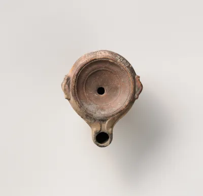 Terracotta oil lamp