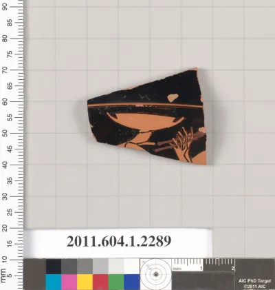 Terracotta fragment of a kylix (drinking cup)