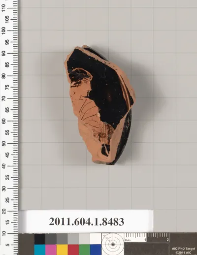 Terracotta fragment of a stemless kylix (drinking cup)