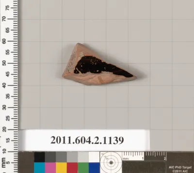 Terracotta fragment of a lekanis lid (covered dish)