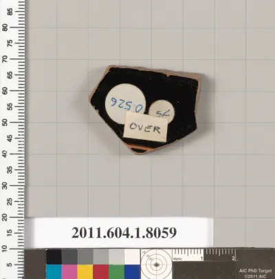 Terracotta fragment of a kylix (drinking cup)