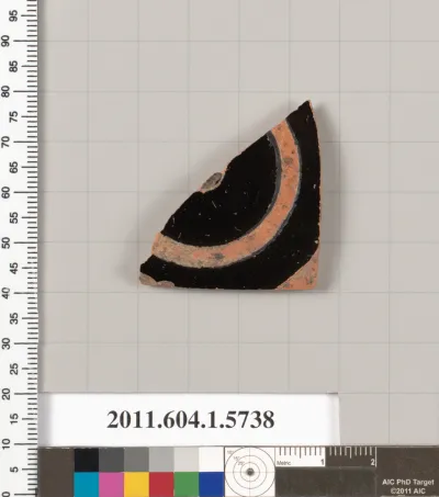 Terracotta fragment of a kylix: eye-cup  (drinking cup)