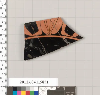 Terracotta fragment of a kylix: eye-cup  (drinking cup)