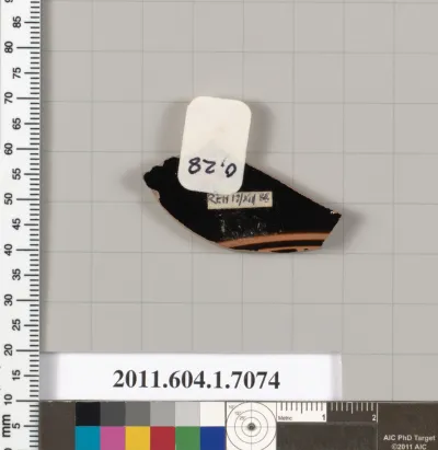 Terracotta fragment of a kylix (drinking cup)