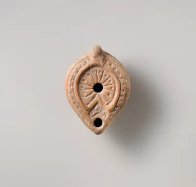 Terracotta oil lamp