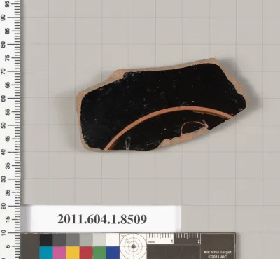 Terracotta fragment of a stemless kylix (drinking cup)