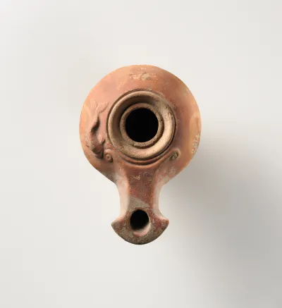 Terracotta oil lamp