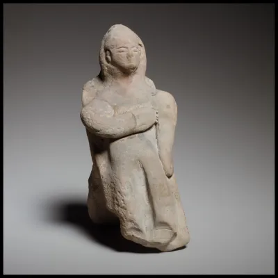 Seated female figurine