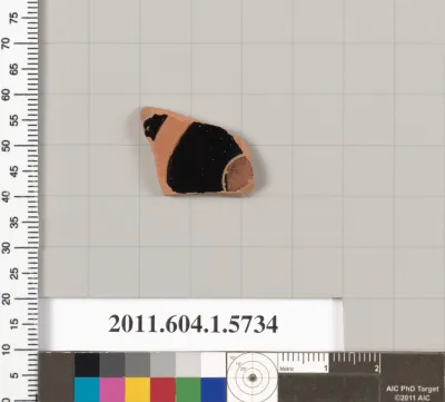 Terracotta fragment of a kylix: eye-cup  (drinking cup)