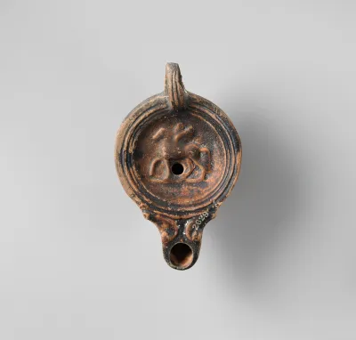 Terracotta oil lamp