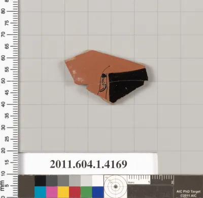 Terracotta fragment of a kylix (drinking cup)