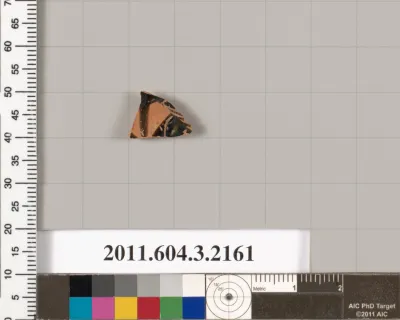 Terracotta fragment of a kylix (drinking cup)