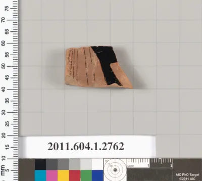 Terracotta fragment of a kylix (drinking cup)