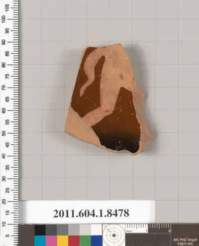 Terracotta fragment of a stemless kylix (drinking cup)