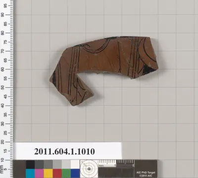 Terracotta fragment of a kylix (drinking cup)