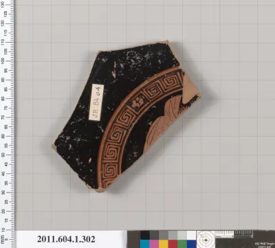 Terracotta fragment of a kylix (drinking cup)