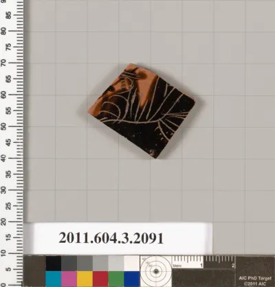 Terracotta fragment of a kylix (drinking cup)