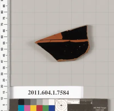 Terracotta fragment of a kylix (drinking cup)