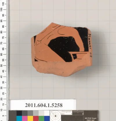 Terracotta fragment of a kylix (drinking cup)