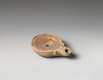 Terracotta oil lamp