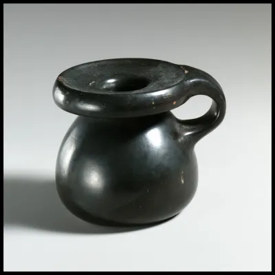 Terracotta perfume pot