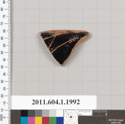 Terracotta rim fragment of a kylix (drinking cup)