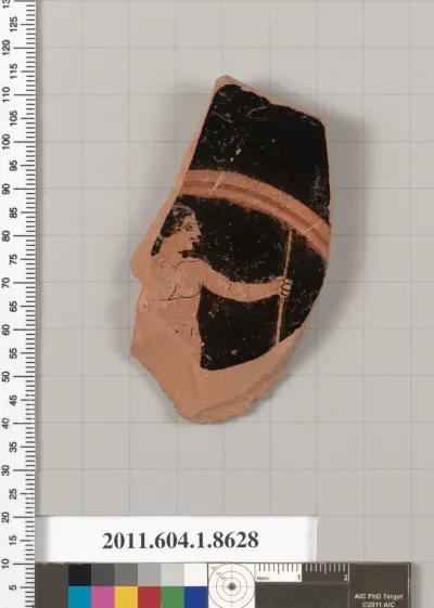 Terracotta fragment of a stemless kylix (drinking cup)
