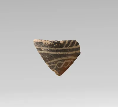 Terracotta rim fragment with quirks and bands