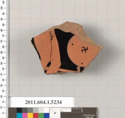 Terracotta fragment of a kylix (drinking cup)