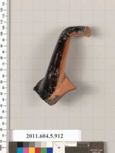 Terracotta fragment of a kylix (drinking cup)