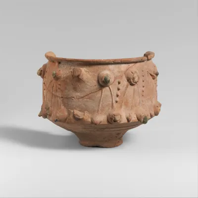 Fragmentary terracotta cup