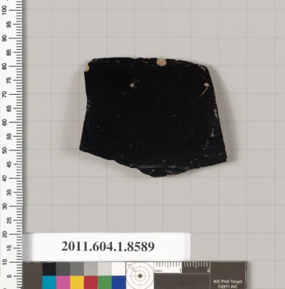 Terracotta fragment of a stemless kylix (drinking cup)