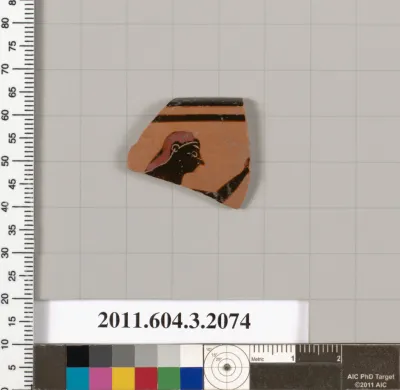 Terracotta rim fragment of a kylix (drinking cup)