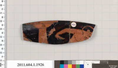 Terracotta rim fragment of a kylix (drinking cup)