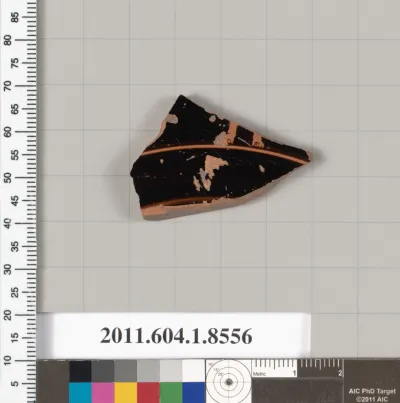 Terracotta fragment of a stemless kylix (drinking cup)