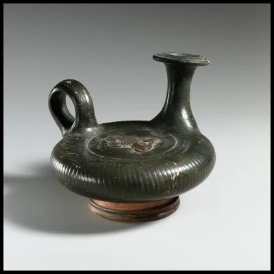 Terracotta guttus (flask with handle and verticle spout)