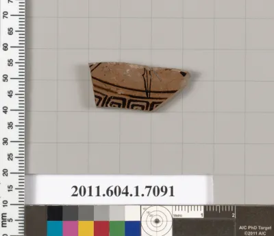 Terracotta fragment of a kylix (drinking cup)