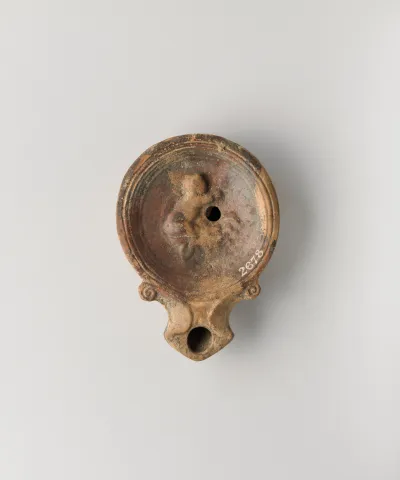 Terracotta oil lamp