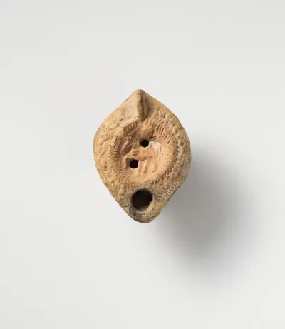 Terracotta oil lamp