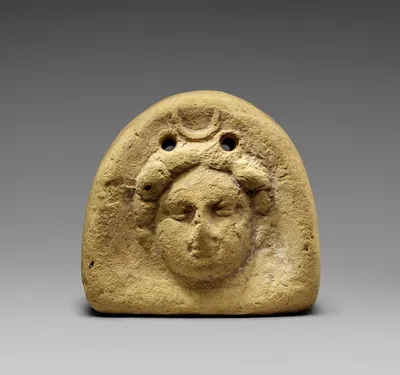 Loom weight with a Gorgon head