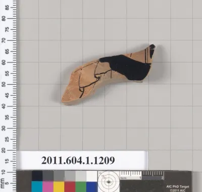 Terracotta fragment of a kylix (drinking cup)