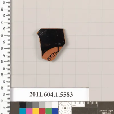 Terracotta rim fragment of a kylix (drinking cup)