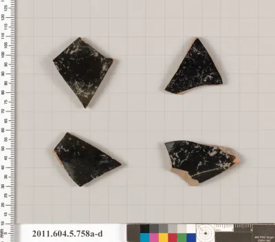 Terracotta fragments of kylikes (drinking cups)