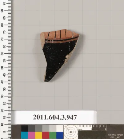 Terracotta fragment of a lekanis lid (covered dish)